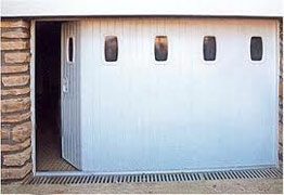Portes de garage coulissantes latérale